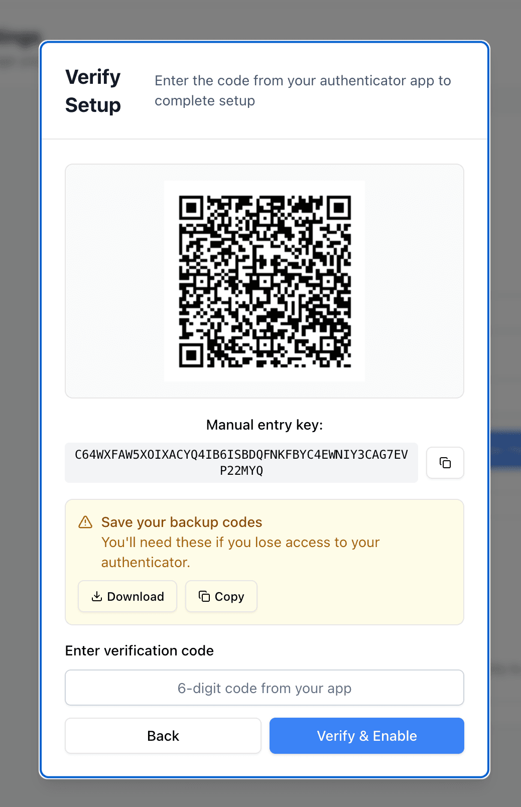 Two-factor authentication setup showing QR code, manual entry key, backup codes, and verification input